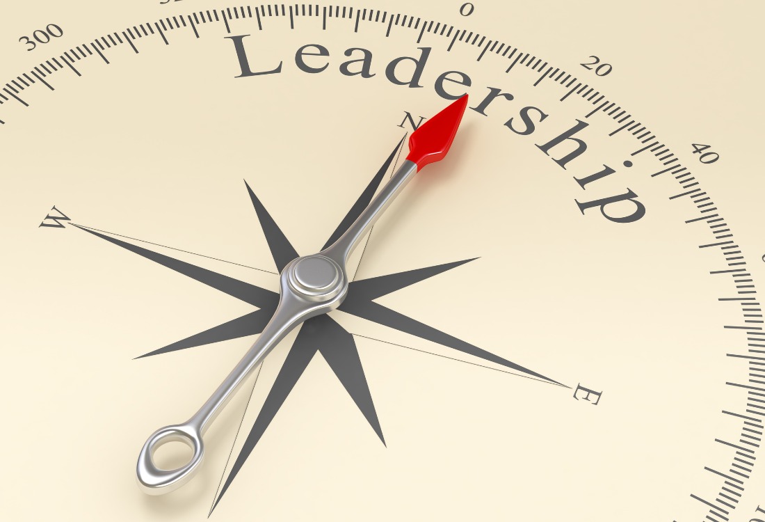 Compass pointing to leadership direction for effective development training on budget.