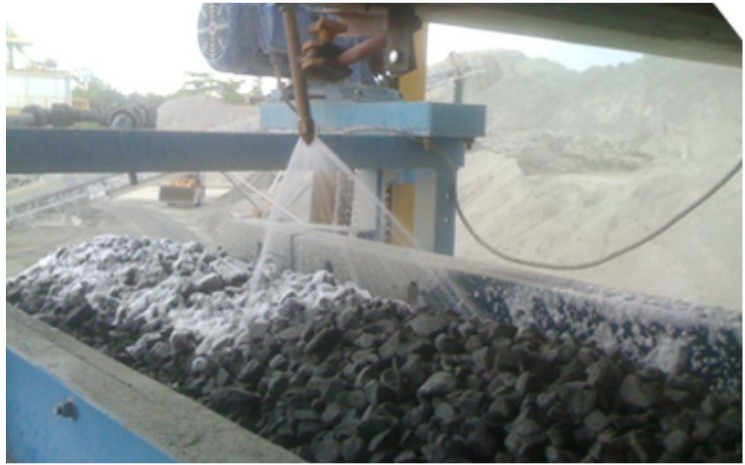 Foam dust suppression solution being used on wagon transfer