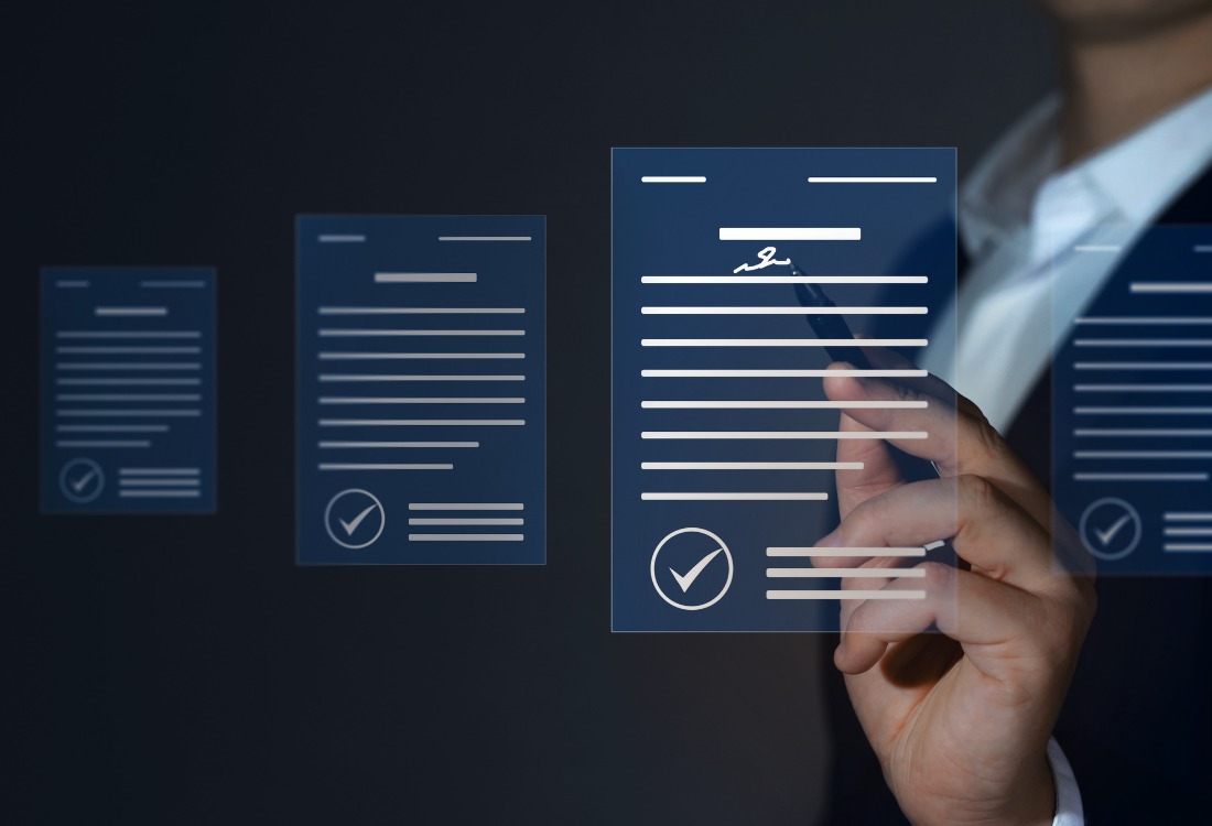 Legal professional using a digital document management system on a computer, streamlining access to case files and records.