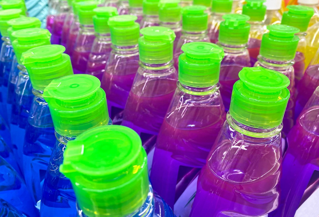 Bottles of private-label chemicals with a unique formulation specifically created for this reseller.