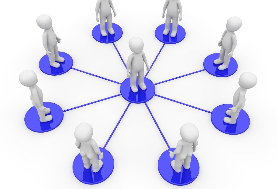 Illustration of people connected in a network around a central figure, representing organisational culture and collaboration.