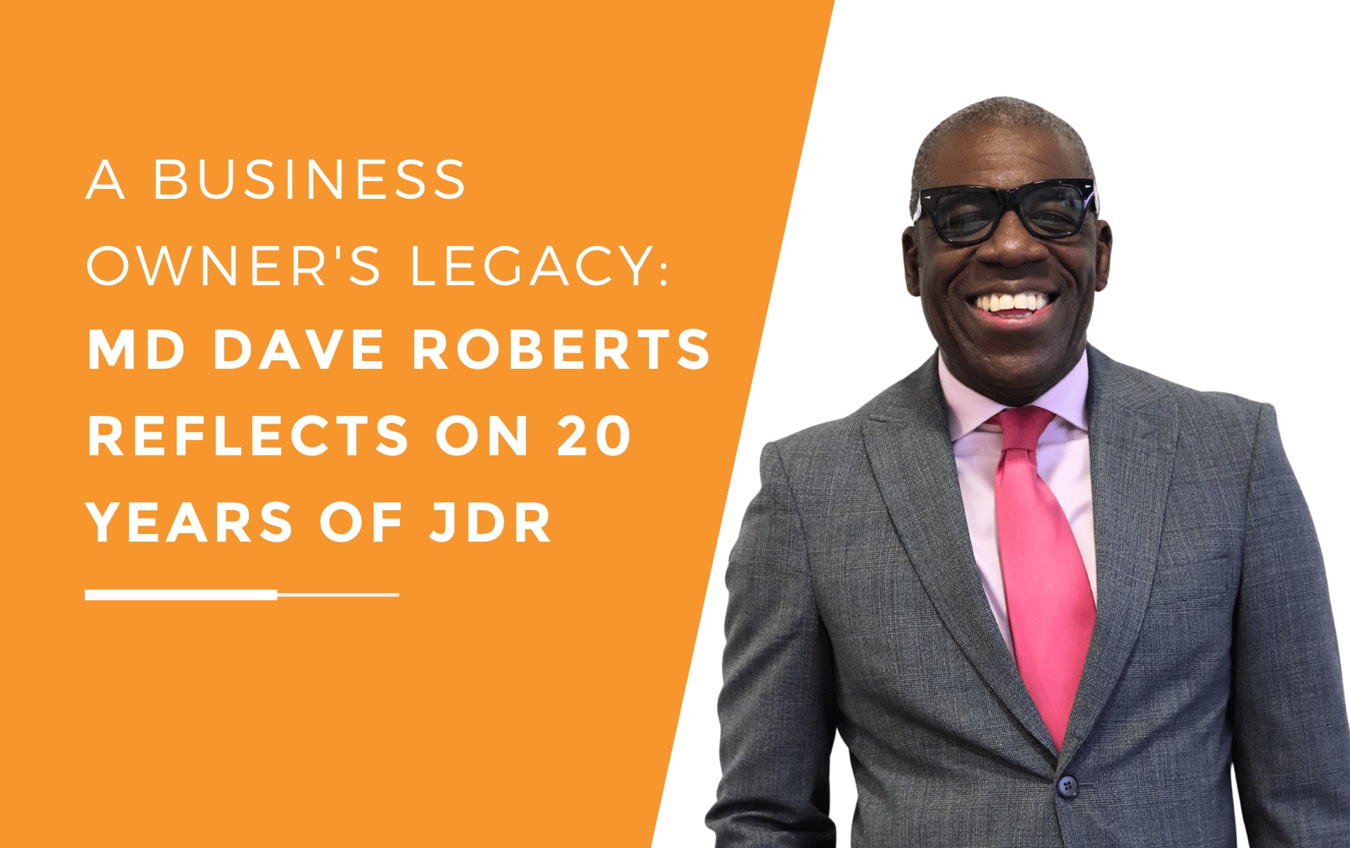 MD Dave Roberts with a big smile celebrating 20 years of JDR.