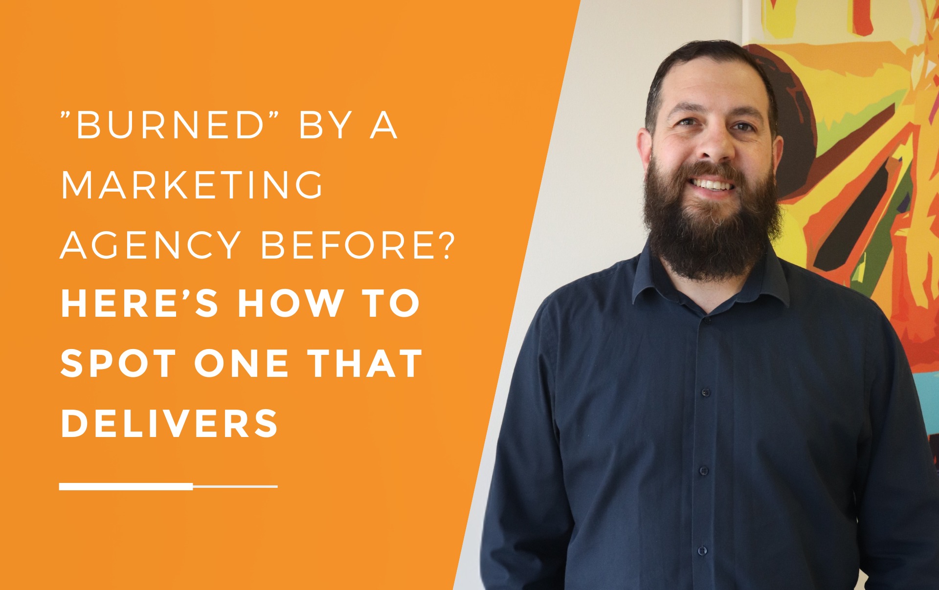 Jarrad from JDR smiling as he walks business owners through how to chose the right marketing agency.
