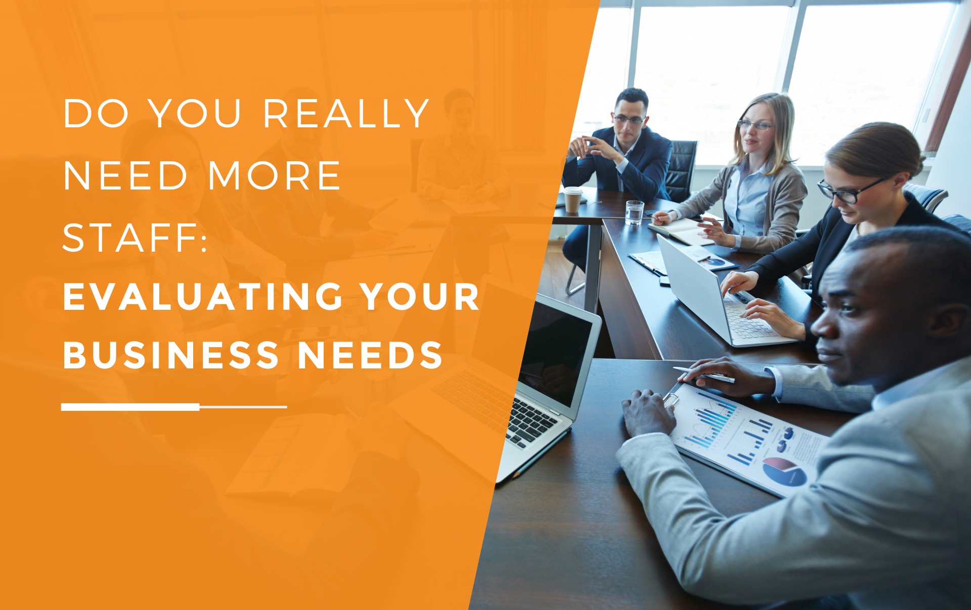 A group of managers in a business discussing if they need to hire more staff or not.