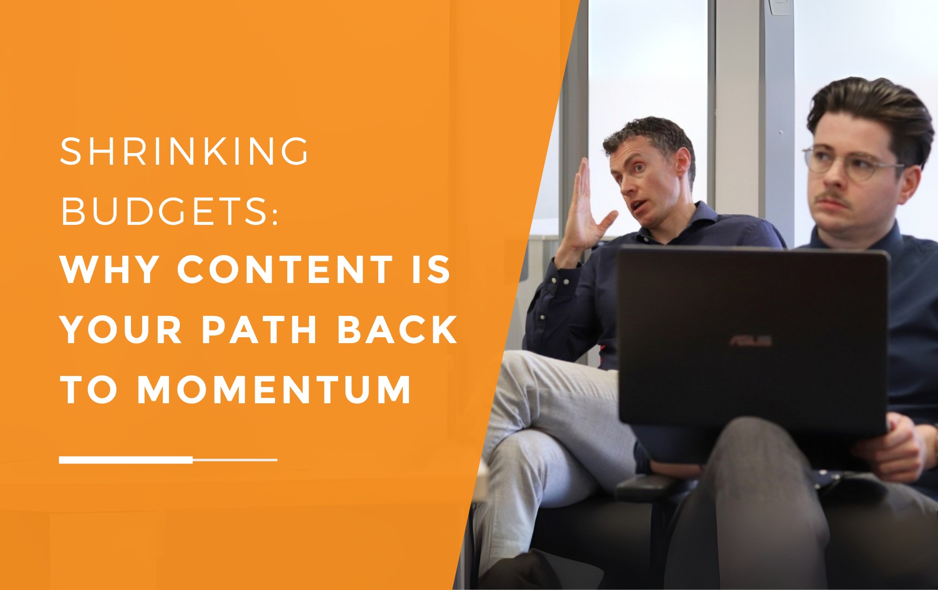Will and John from JDR in a meeting, one speaking and gesturing while the other listens and takes notes on why content marketing is the best way forward for businesses struggling to stay afloat..