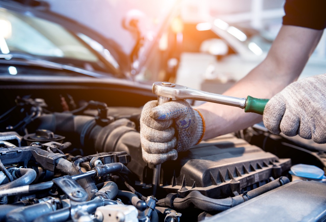 Vehicle owner consulting with a preferred auto repair technician, emphasizing the advantages of choosing your own repairer.