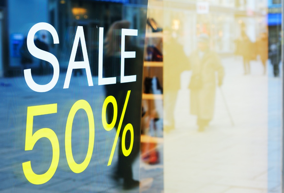 A window graphic of a shop showing 50% sale offer.