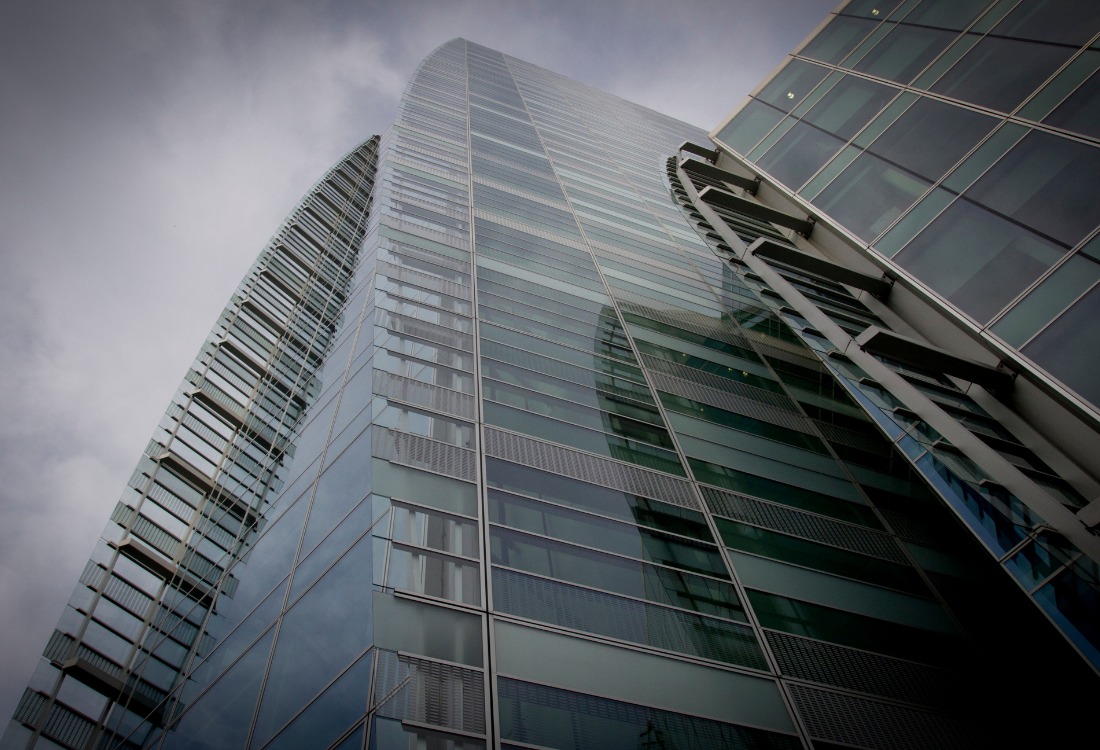 Smart glazing systems are used on a commercial building to reduce energy consumption.