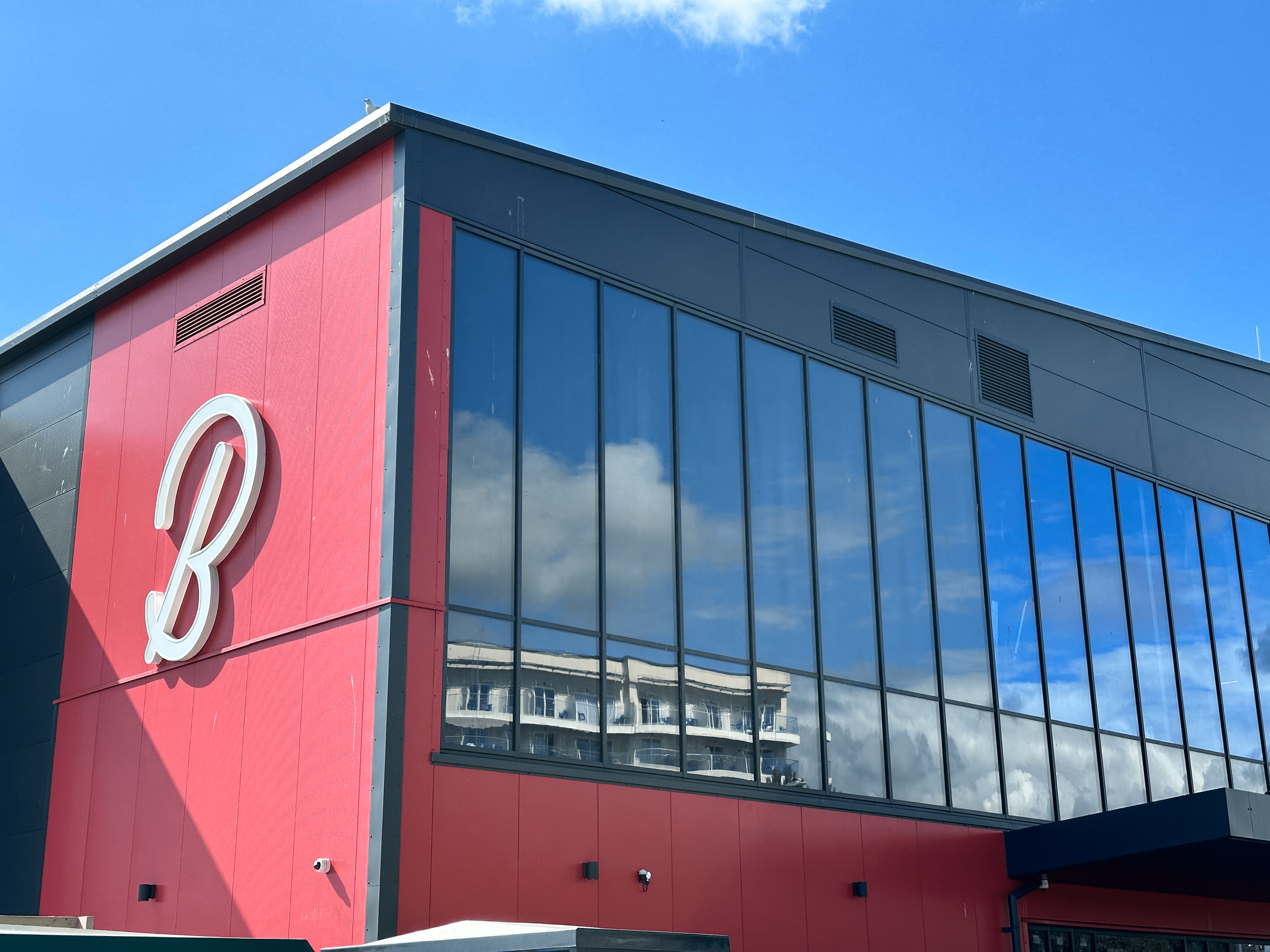 An external façade system where metal cladding was used due to its weather resistance.