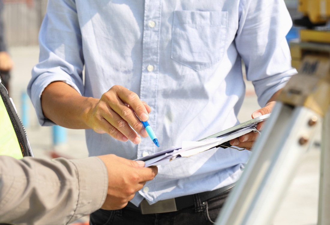 A director looking a the list of rainscreen cladding contractors available to help him after his building failed the EWS1 survey. 