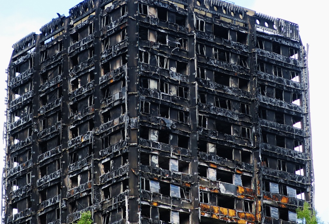 Grenfell building in fire after the fire doors failed.