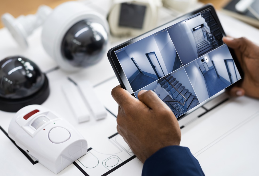 A video of a traditional security system that requires manual surveillance in comparison to a cloud-based system.