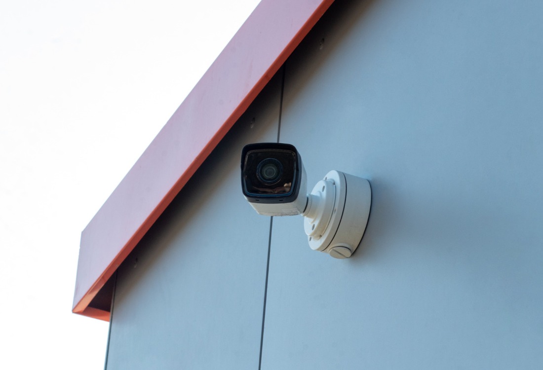 A security system camera set up in a public area in compliance with Martyn’s Law regulations.