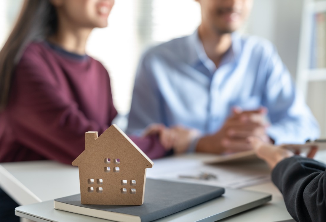 A couple trying to obtain the best first-time buyer mortgage rate to purchase their first property.