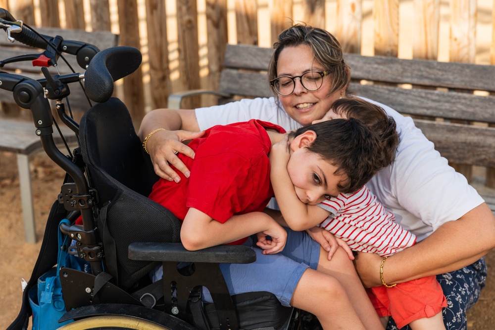 Bystander supporting overscheduled family during transition - parent rushing kids to activities