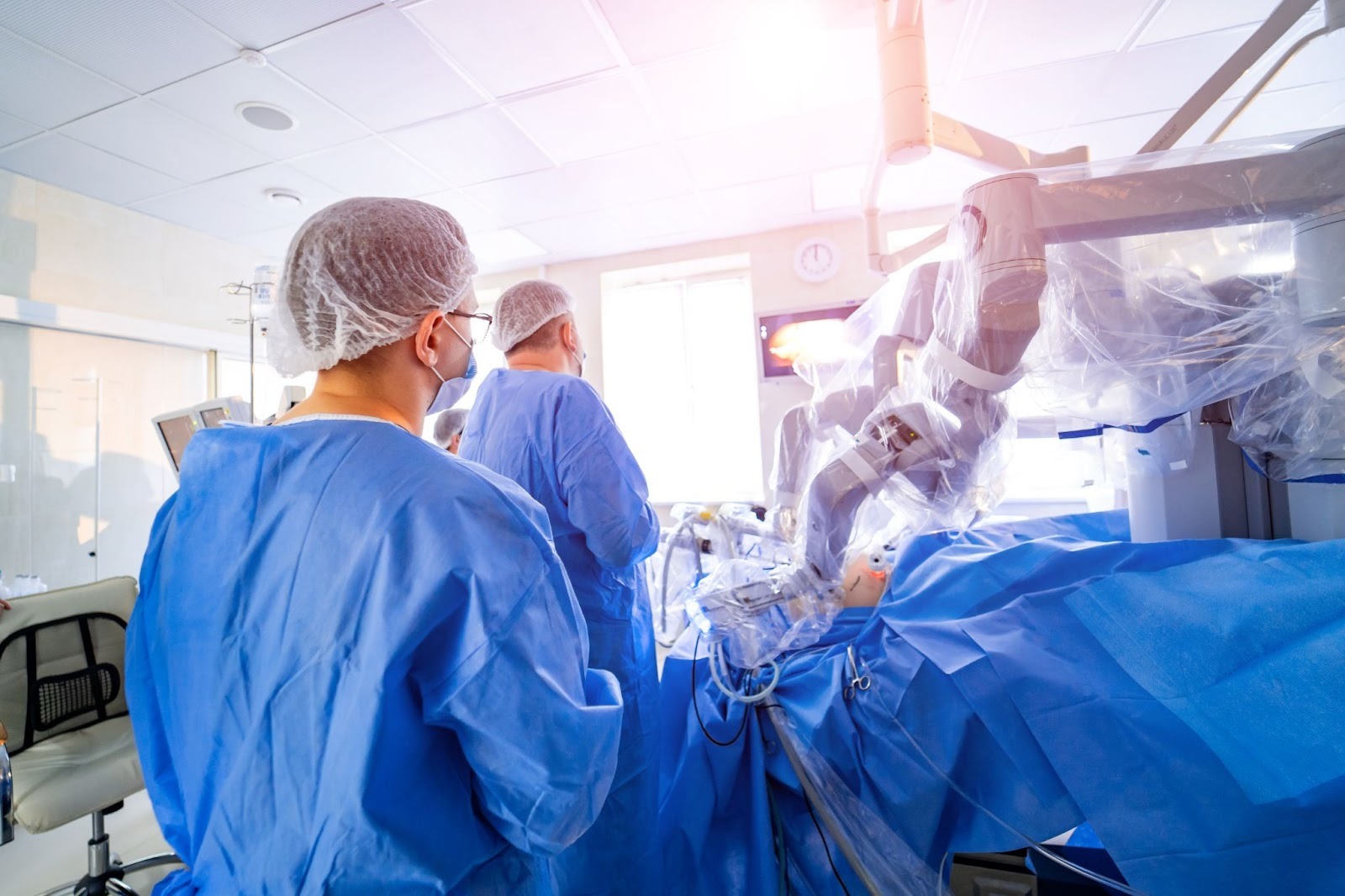 Surgeons performing a laparoscopic procedure.