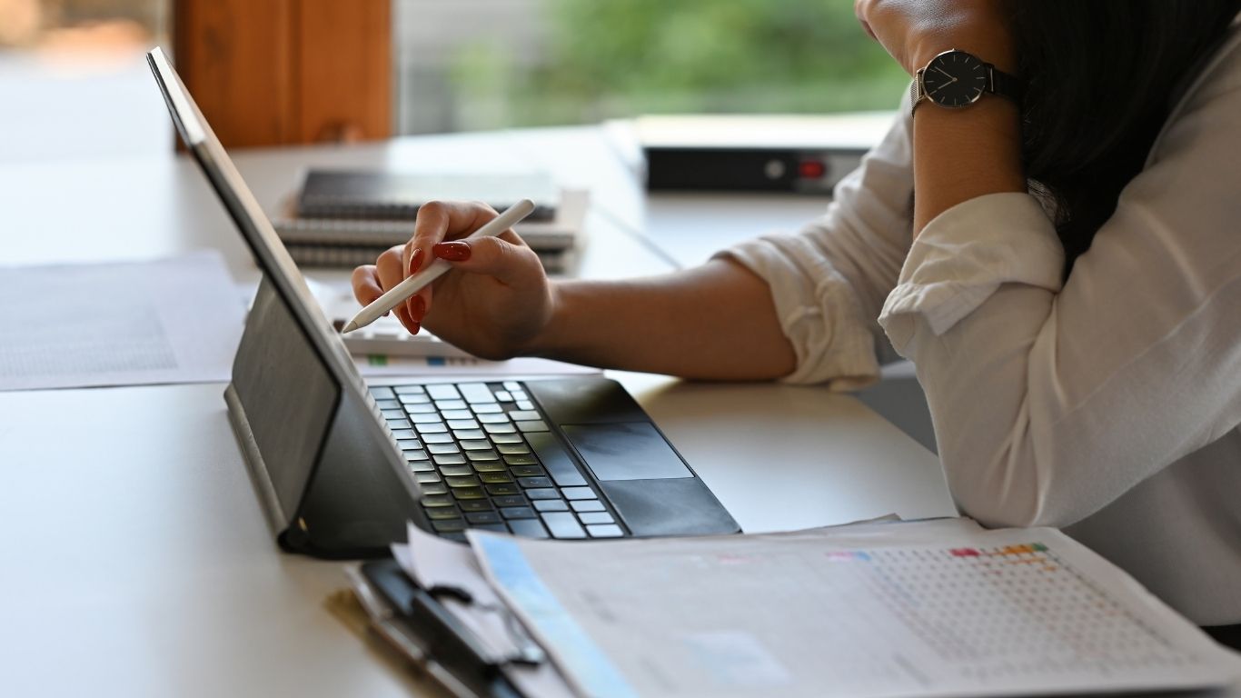 An evaluator using a tablet to log Post-Closing Defects found during a review.