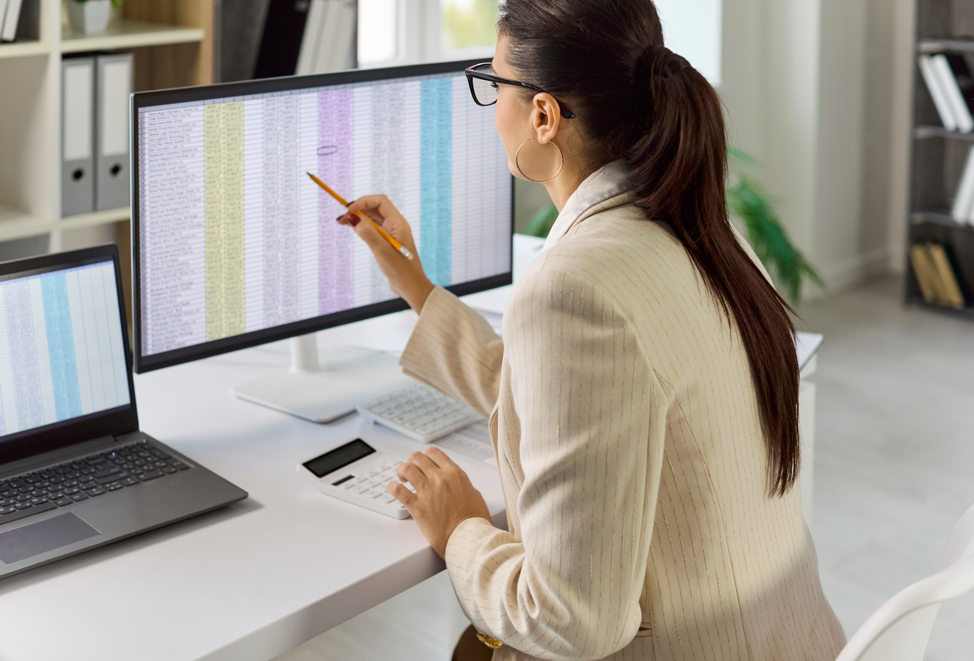 Accounting professional reviewing HOA payment and financial records