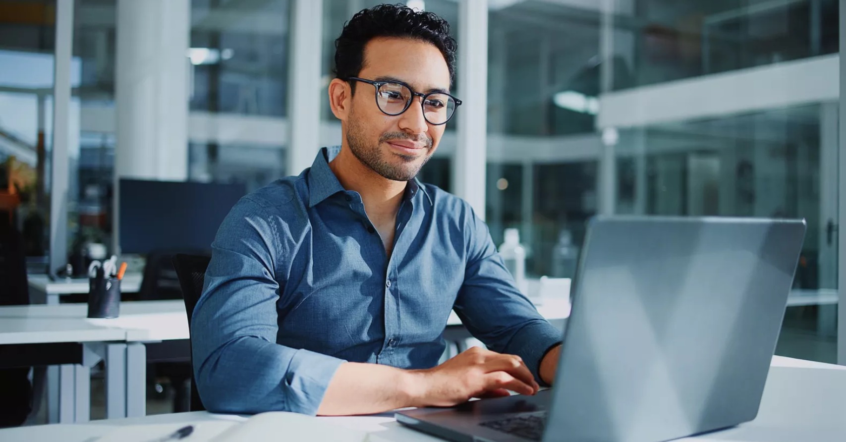 Maintenance technician managing repair requests with digital software