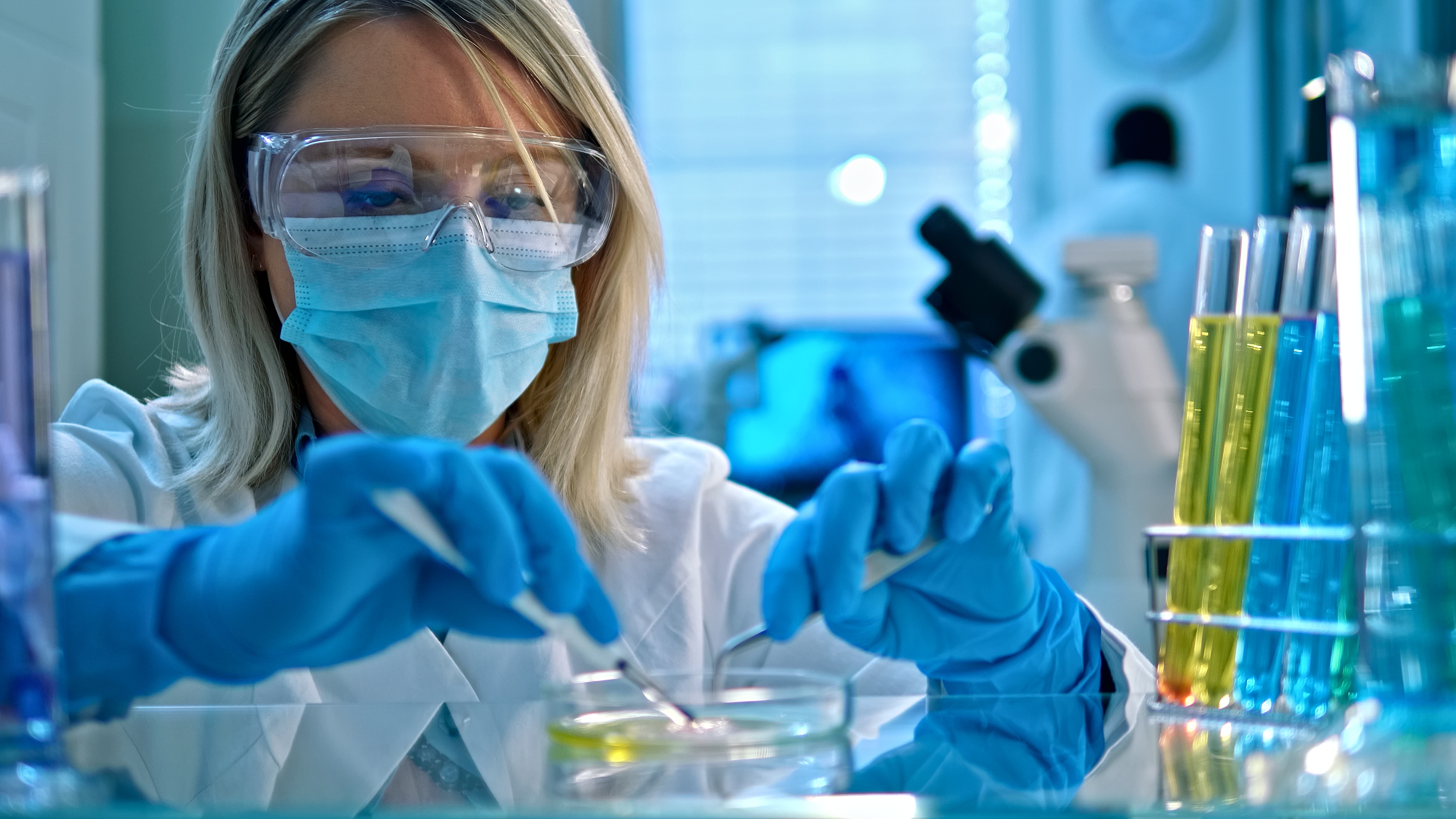 Close up of a woman doing scientific experiments